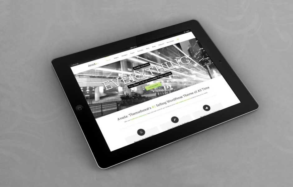Tablet displaying a modern website layout in a sleek environment.